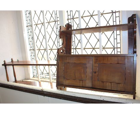 A Victorian mahogany wall shelf with pierced supports and cupboard, 56cm, together with a rosewood two-tier wall shelf, 69cm