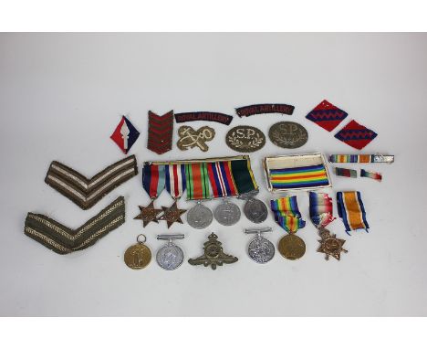 Two pairs of World War I medals, one set awarded 1365 PTE W Rowley R Suss R, the other 68695 GNR W S Fallick RA, a 1914-15 St