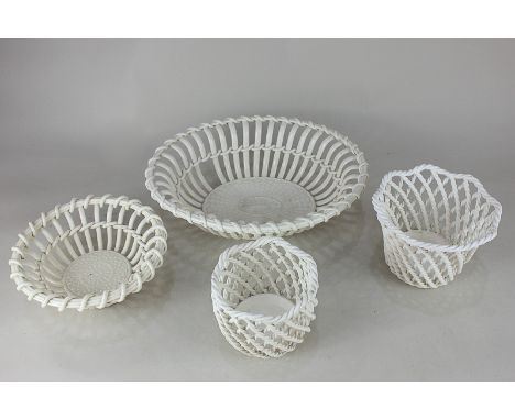 Four various white glazed ceramic ropework baskets, two similar side plates, two blue and white printed dishes and three pink