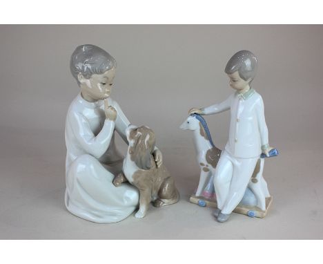 A Lladro porcelain figure of a child, seated with a spaniel, 20cm high and a Nao figure of a child on a hobby horse