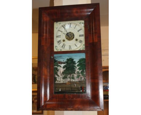 A Seth Thomas (American) wall clock with rectangular mahogany case and glazed panel door with coloured transfer depicting the