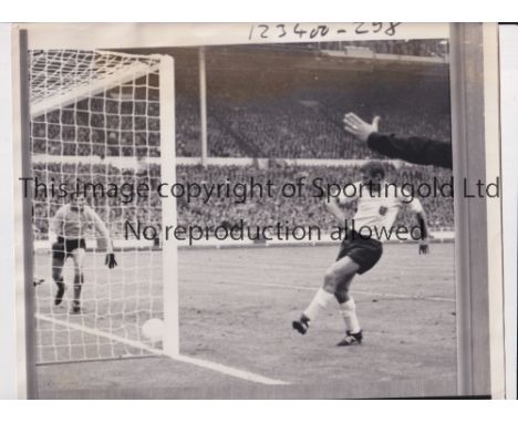 1966 WORLD CUP PRESS PHOTO / ENGLAND     Original b/w 11" X 9" with stamp and paper notation on the reverse of Roger Hunt sco