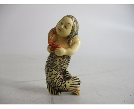 Antique Japanese netsuke figurine mermaid. 