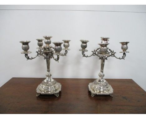 Pair of vintage decorative silver coloured candelabra.  H33 x W28cms 