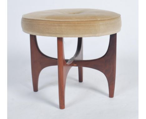 A retro 20th century teak wood circular G-Plan dressing table stool raised on teak wood x-cross base with velour upholstered 