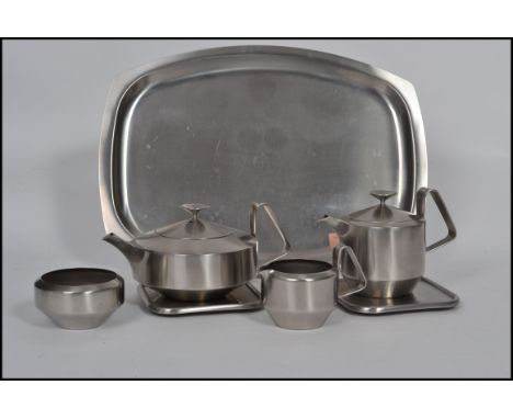 A vintage mid 20th century retro Robert Welch for Old Hall stainless steel Alveston tea service having shaped angular handles