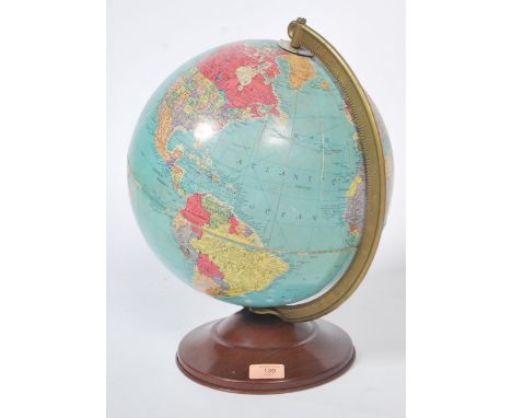 A vintage 20th century Replogle 12" tin plate based desk top precision globe. Good colours with faux wood tinplate circular b