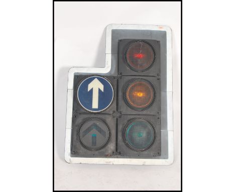 A large set of L-Shaped Industrial traffic lights complete with the blinker hoods and raised on tall bodies. Led Red Amber Gr