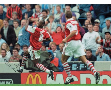 Football Ian Wright signed 16x12 Arsenal colour photo. Good condition. All autographs come with a Certificate of Authenticity