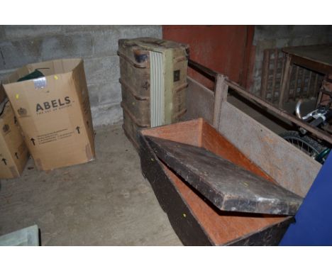 A canvas and a wooden bound travelling trunk and a wooden storage box 