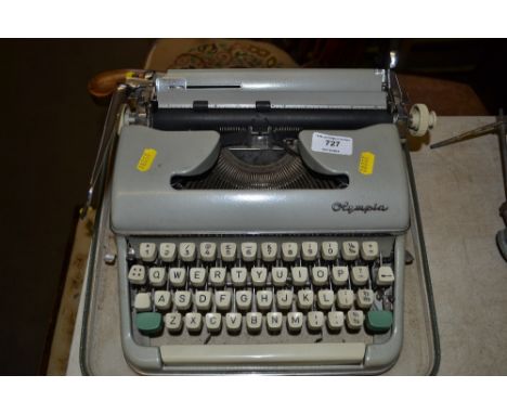An Olympia portable typewriter 