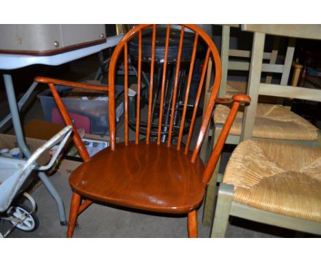 A painted Ercol style stick elbow chair