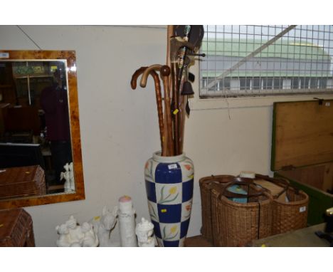 A china stick stand and contents