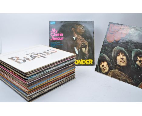 Collection of late 20th century rock LP vinyl records, examples including The Beatles Rubber Soul PMC 1267, Stevie Wonder Son