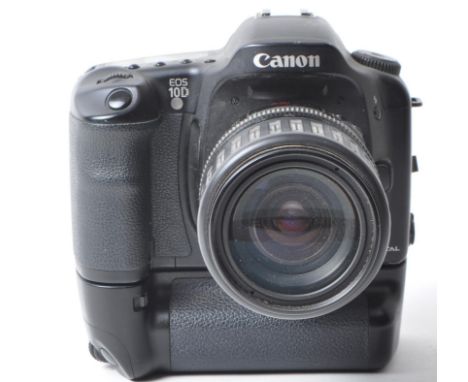 Canon - A vintage circa 2003 Canon EOS 10D digital SLR camera. The camera in black colourway, with Canon Zoom Lens EF 35-135m