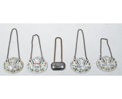 Late 19th / early 20th century French enameled copper decanter labels. Comprised of four enameled copper labels, 'Sherry', 'P
