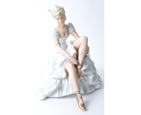 Schaubach Kunst - A 20th century circa 1926 - 1950 Schaubach Kunst porcelain lady figure. The figure in the form of a lady ba