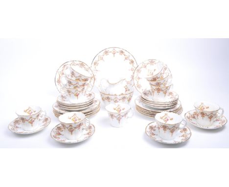 Royal Albert - An early 20th century Royal Albert bone china tea service. The collection to include a selection of teacups, a