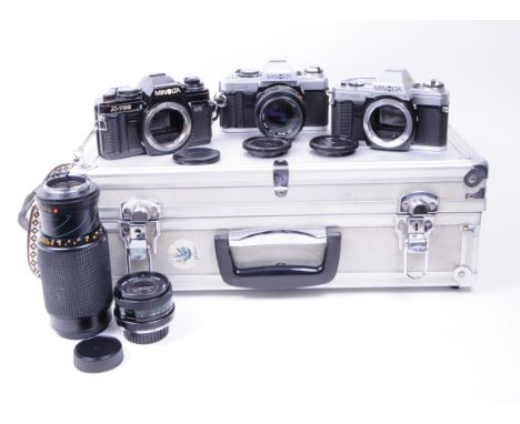 Minolta - A collection of vintage mid 20th century Minolta 35mm SLR cameras and accessories. The collection to include Minolt