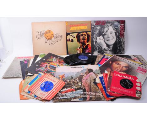 Collection of late 20th century rock LP and 45s vinyl records. Artists including Cream, Bob Dylan, Neil Young, Jimi Hendrix, 