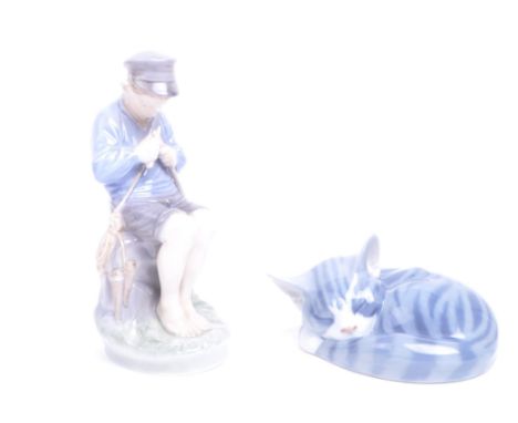 Royal Copenhagen - Two 20th century Danish porcelain figures, comprised of number 422 sleeping tabby cat figure and number 90