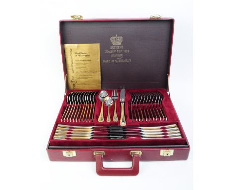 Solingen - West German 1829 23-4 carat gold plated twelve setting cutlery canteen with certificate of warranty. Cutlery house