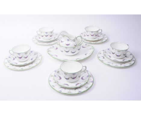 Royal Doulton - Early 20th century porcelain part tea service comprised of tea cups, saucers, small plates, serving plate, ju