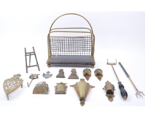 Early 20th century Edwardian brass and wooden magazine rack with other brass wares including fire implements, trivet, clips, 