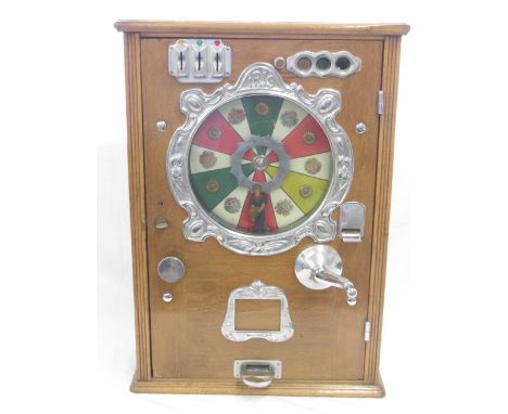 Vintage oak cased 'Iris' penny slot machine, 50.5cm x 20cm x 71.5cm 