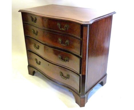 A George III Mahogany Serpentine Commode, The Moulded Top above four long drawers with brass handles, raised upon bracket fee