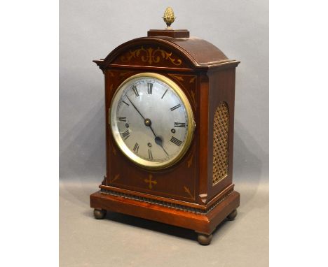An Early 19th Century Mahogany Brass Inlaid Bracket Clock, the silver dial with Roman numerals and with three train movement 