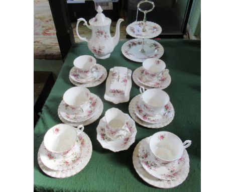 A Royal Albert Lavender Rose pattern part-tea service, a six place setting, comprising: trios, two tier cake plate, teapot an