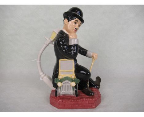 A Kevin Francis (Peggy Davies) novelty ceramic jug, modelled as Charlie Chaplin, by Andy Moss, 22cm.