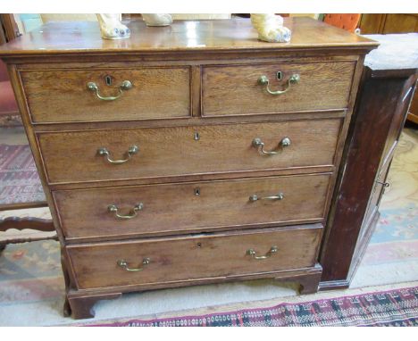 A 19th century oak chest, having two shot over three long drawers on bracket feet, 95cm wide.