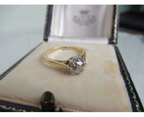 A single stone diamond ring, the cushion cut old brilliant cut diamond in simple claw mount, to a plain 18ct gold shank. Cond