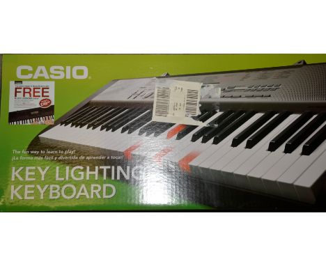 Casio T-Lighting Keyboard LK - 120 (runs on batteries)