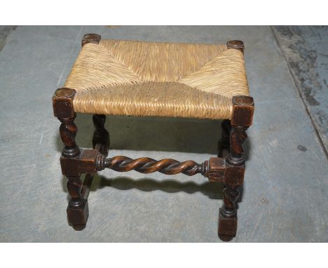 Oak rush topped stool on barley twist supports