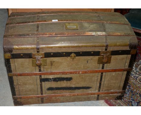 Large wooden slated domed top trunk, with painted detail and brass plaque for M E. Harle