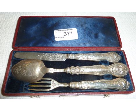 Cased silver knife, fork and spoon with king's pattern handles and scrolled engraving