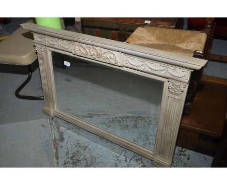Carved light wood framed over mantel mirror 