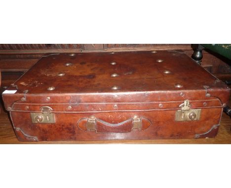 Leather bound trunk with fitted interior 