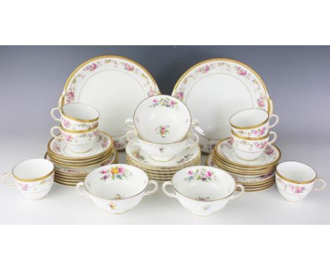 An early 20th century Royal Crown Derby part tea service comprising; four teacups, nine saucers, nine side plates and two cir