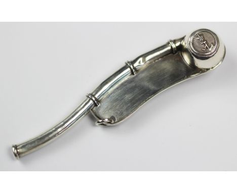 A George V silver Bosun's whistle, Haseler Brothers, Chester 1912, modelled as a bosun's whistle with naval anchor decoration