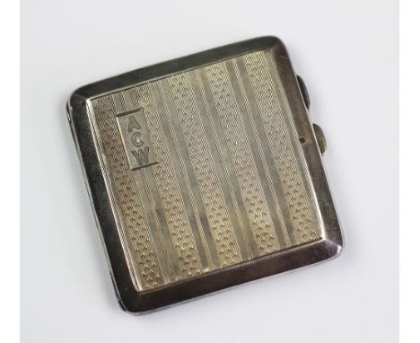 A George V Art Deco silver cigarette case, W T Wiseman, Birmingham 1929, with banded engine turned decoration and cartouche i
