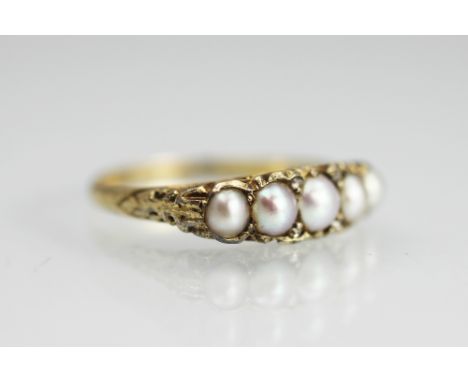 A five stone pearl ring, the five, graduated untested, split pearls, each within boat shaped setting and interspersed with ro