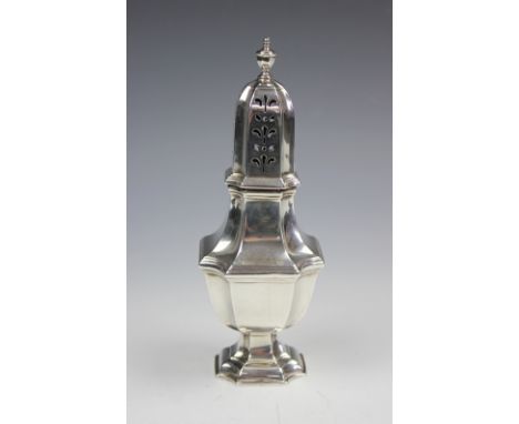 A George VI silver sugar caster, William Hutton & Sons Ltd, Sheffield 1938, the canted square form caster with urn moulded fi