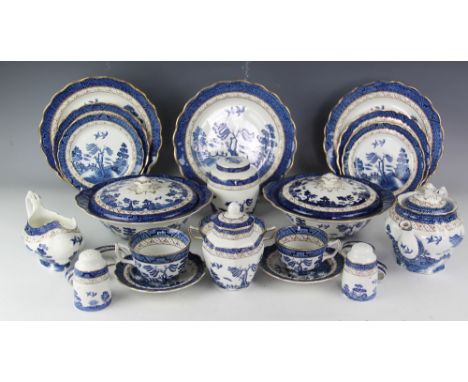 A large quantity of Booths 'Real Old Willow' pattern dinner wares to include two tureens and covers, a teapot and cover, dinn