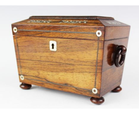 A William IV rosewood and mother of pearl tea caddy, of sarcophagus shape upon four bun feet with turned wooded handles enclo