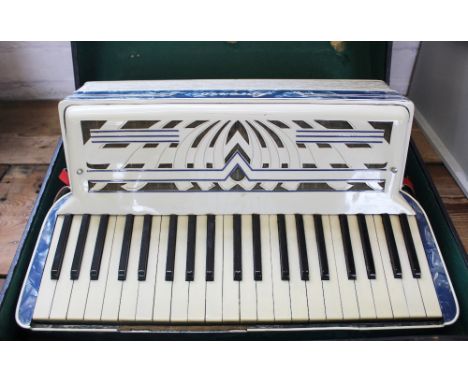 A Lorenzo piano accordion, in case 