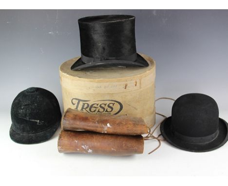 A Robert Heath mole skin top hat, internal aperture 15.5cm x 19cm (approx), in box, a Lincoln Bennett & Co riding hat (sold a